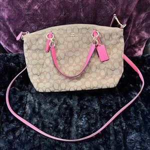 Coach crossbody with signature canvas fabric with hot pink accents